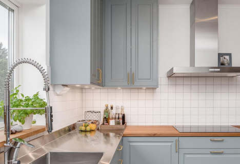 Denco31 Luxury Light Grey Shaker Kitchen Cabinets | Brass Hardware & Stainless Steel Countertops