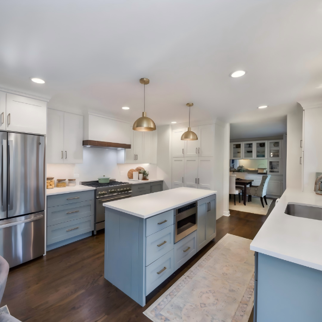Denco24 Elegant Blue-Grey & White Shaker Cabinets – Brass Accents for a Timeless Modern Kitchen